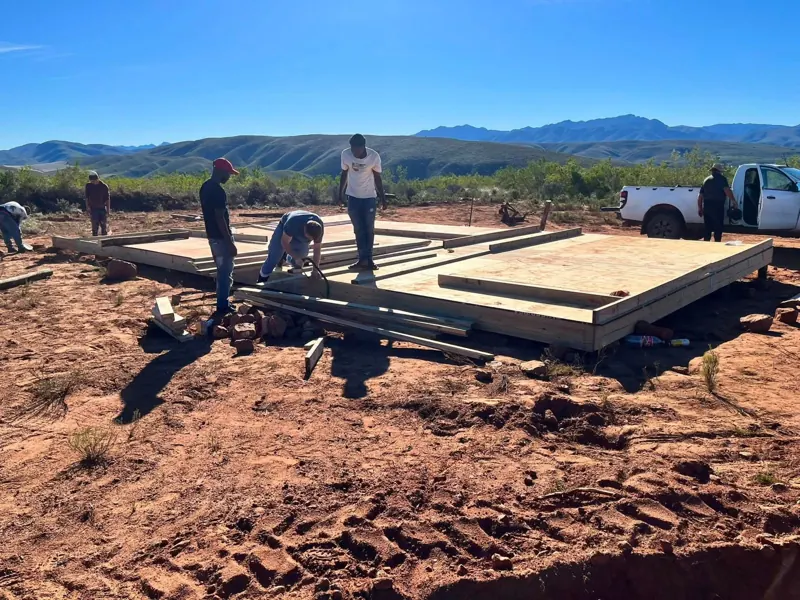 Team laying the floor platform