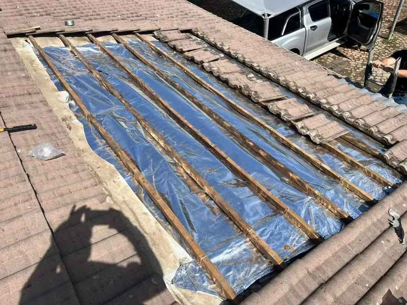 Roof repair: new underlay going in